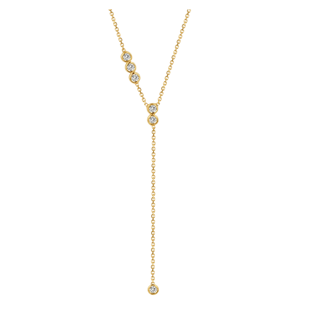 Gold necklace with small diamonds on a white background