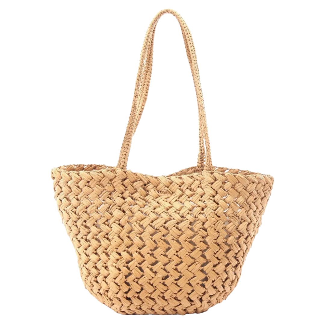 Woven straw bag on a white background