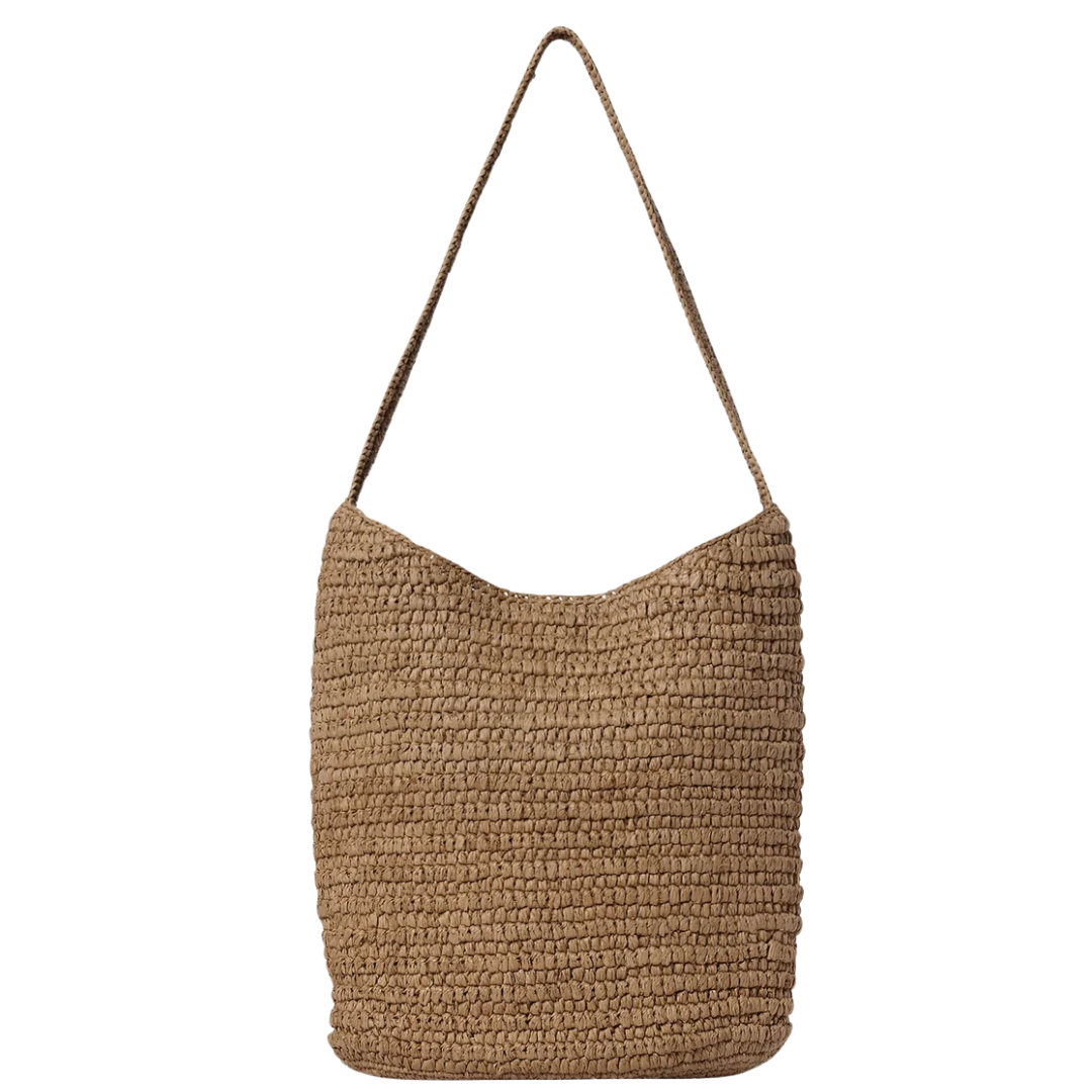 Brown woven handbag with a strap on a white background