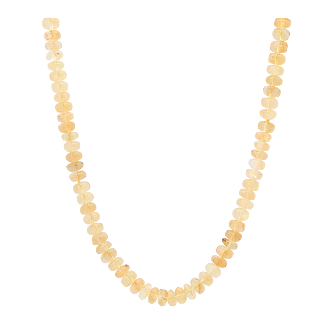 Necklace with yellow beaded stones on a white background