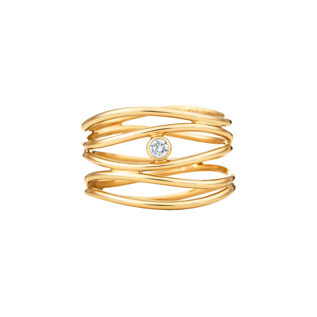 A gold wrap ring with multiple twisted bands and a small round clear gemstone in the center, shown on a plain white background.