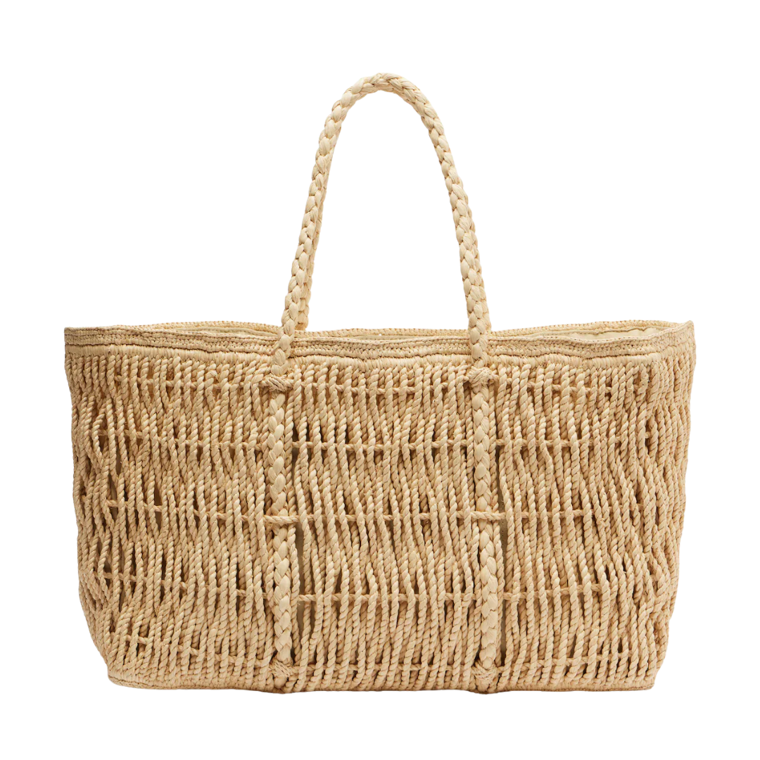 A natural woven straw tote bag with two braided shoulder straps, shown against a plain white background.